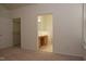 Spacious bedroom with neutral carpet, walk-in closet and ensuite bath at 10461 Dapping Dr, Raleigh, NC 27614
