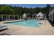 Community pool with lounge chairs at 10461 Dapping Dr, Raleigh, NC 27614