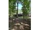 Spacious backyard surrounded by lush greenery at 10505 Winding Wood Trail Trl, Raleigh, NC 27613