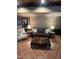 Cozy seating area with leather sofa at 10505 Winding Wood Trail Trl, Raleigh, NC 27613