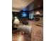 Entertaining basement with brick fireplace and cozy seating at 10505 Winding Wood Trail Trl, Raleigh, NC 27613