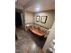 Elegant bathroom features a copper soaking tub, tiled floors, and stylish decor, offering a luxurious spa-like experience at 10505 Winding Wood Trail Trl, Raleigh, NC 27613