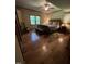 Comfortable bedroom featuring a large bed, window view, and stylish decor at 10505 Winding Wood Trail Trl, Raleigh, NC 27613
