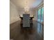 Bright dining room with hardwood floors and elegant decor at 10505 Winding Wood Trail Trl, Raleigh, NC 27613
