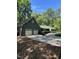 Charming home with a two-car garage and well-maintained landscaping at 10505 Winding Wood Trail Trl, Raleigh, NC 27613