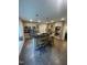 Modern kitchen with island seating, stainless steel appliances, and ample counter space at 10505 Winding Wood Trail Trl, Raleigh, NC 27613