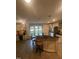 Bright kitchen with an island, bar stool seating, stainless steel appliances, and granite countertops at 10505 Winding Wood Trail Trl, Raleigh, NC 27613
