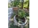 Close-up of mailbox with decorative stone and landscaping at 10505 Winding Wood Trail Trl, Raleigh, NC 27613