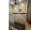 Tiled shower features a rainfall shower head and a slate tile base at 10505 Winding Wood Trail Trl, Raleigh, NC 27613