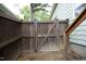 The wood fence encloses the backyard, creating a safe and private outdoor space at 106 Eugene St, Carrboro, NC 27510
