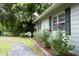 Charming home exterior featuring a well-manicured garden, stone path, and lovely landscaping at 106 Eugene St, Carrboro, NC 27510
