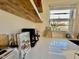 Modern kitchen countertop with floating shelves and view from window at 106 Eugene St, Carrboro, NC 27510