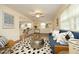 Bright living room with hardwood floors, modern decor, and a comfortable seating area at 106 Eugene St, Carrboro, NC 27510