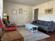 Living room features hardwood floors, neutral paint, and natural light at 106 Eugene St, Carrboro, NC 27510