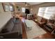 Bright living room features hardwood floors, ceiling fan and a comfortable seating arrangement at 106 Eugene St, Carrboro, NC 27510