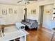 Cozy living room with hardwood floors, neutral paint, and ample natural light at 106 Eugene St, Carrboro, NC 27510