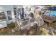 Aerial view of backyard with deck, swimming pool, and lush landscaping at 106 Wolverton Dr, Clayton, NC 27527