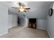 Bedroom featuring neutral walls, carpeted floor, natural light, ceiling fan, and closet at 106 Wolverton Dr, Clayton, NC 27527