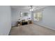 Bright bedroom with neutral walls, a ceiling fan, and natural light from a window at 106 Wolverton Dr, Clayton, NC 27527