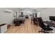 A cozy interior with a bed, kitchenette, dining area, and desk at 106 Wolverton Dr, Clayton, NC 27527