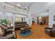 Open floor plan with living room, dining area, and kitchen featuring hardwood floors at 106 Wolverton Dr, Clayton, NC 27527