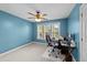 Bright office space with a large window, ceiling fan, and comfortable executive chair at 106 Wolverton Dr, Clayton, NC 27527