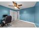 Functional office space with a ceiling fan, carpet and ample natural light from nearby window at 106 Wolverton Dr, Clayton, NC 27527