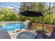 Inviting backyard pool with deck and lounge chairs, perfect for summer relaxation at 106 Wolverton Dr, Clayton, NC 27527