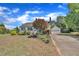 Lovely home with a detached garage and long driveway, complemented by colorful landscaping at 1112 Turner Farms Rd, Garner, NC 27529
