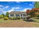 Charming single-story home with well-manicured landscaping and a welcoming front porch at 1112 Turner Farms Rd, Garner, NC 27529