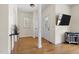 Inviting entryway with hardwood floors, natural light, and an ornate front door at 117 Idlewild Ave, Raleigh, NC 27601