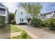 Charming two-story home with a well-maintained front yard and a concrete driveway at 117 Idlewild Ave, Raleigh, NC 27601