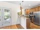 Well-equipped kitchen with modern appliances, granite countertops, and stainless steel appliances at 117 Idlewild Ave, Raleigh, NC 27601