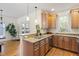 Stylish kitchen with stainless steel appliances, a breakfast bar, and granite countertops at 117 Idlewild Ave, Raleigh, NC 27601