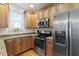 A kitchen featuring stainless steel appliances and granite countertops at 117 Idlewild Ave, Raleigh, NC 27601