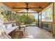 Cozy screened porch with stylish seating and a tranquil outdoor view at 117 Idlewild Ave, Raleigh, NC 27601