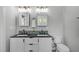 Bathroom boasts a double sink vanity, matte black hardware, and a subway tile backsplash at 120 Avent Pines Ln, Holly Springs, NC 27540