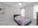 Cozy bedroom with neutral tones, a comfortable bed with decorative pillows, and soft natural lighting at 120 Avent Pines Ln, Holly Springs, NC 27540
