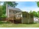 Exterior of a home featuring a deck and backyard at 120 Avent Pines Ln, Holly Springs, NC 27540