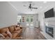 Inviting living room with a fireplace, access to outdoor deck, and stylish decor that enhances the space at 120 Avent Pines Ln, Holly Springs, NC 27540