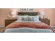 Inviting bedroom showcasing a plush bed with stylish pillows and bedside tables at 1205 Pavo Path, Wendell, NC 27591