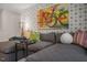 Stylish living room featuring patterned wall, bike art and comfortable seating at 1205 Pavo Path, Wendell, NC 27591