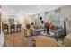 Wide view of the open concept living space, kitchen, and dining area creating an inviting atmosphere at 1205 Pavo Path, Wendell, NC 27591