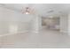 Spacious bonus room with a ceiling fan, neutral paint, dormers and carpeting at 1221 Tartarian Trl, Apex, NC 27502