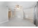 Large bonus room with gray carpet, dormers, neutral paint, and a ceiling fan at 1221 Tartarian Trl, Apex, NC 27502