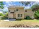 Exterior of home with patio and fenced backyard at 1221 Tartarian Trl, Apex, NC 27502