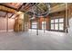 Spacious unfinished basement with concrete floors, exposed ceiling, wooden framing and bright windows at 12508 Angel Falls Rd, Raleigh, NC 27614