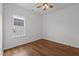 Cozy bedroom with hardwood flooring, and bright double windows at 1303 Whitsett St, Burlington, NC 27217