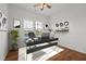 Home office with modern desk, bright windows, stylish decor, and new hard wood floors at 1303 Whitsett St, Burlington, NC 27217