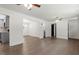 Spacious living area featuring hardwood floors and views of the kitchen and dining room at 1314 Hudson Ave, Durham, NC 27705